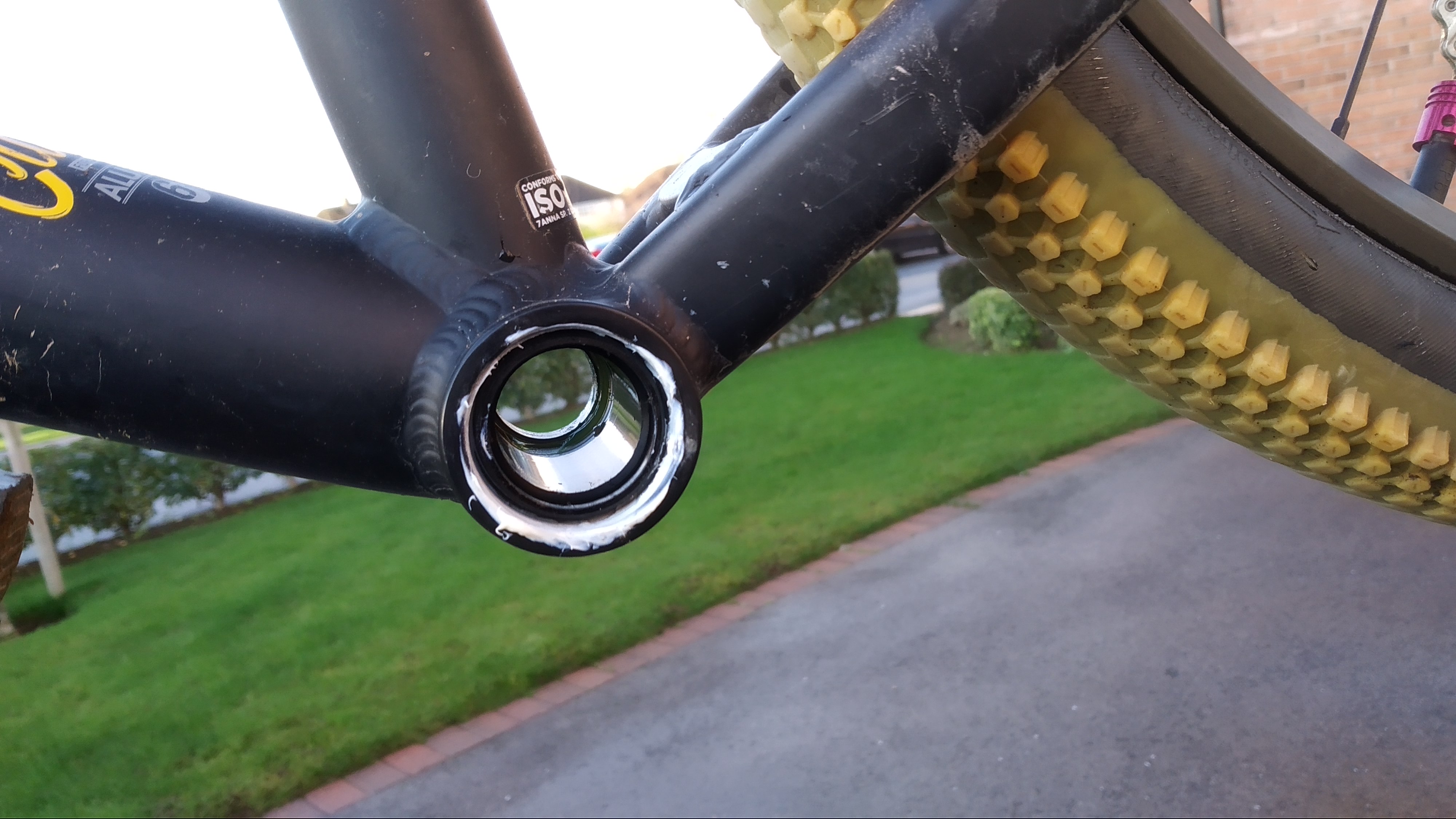 From the non-driveside you can see through the bottom bracket. The middle sleeve is installed, and the threads are greased.