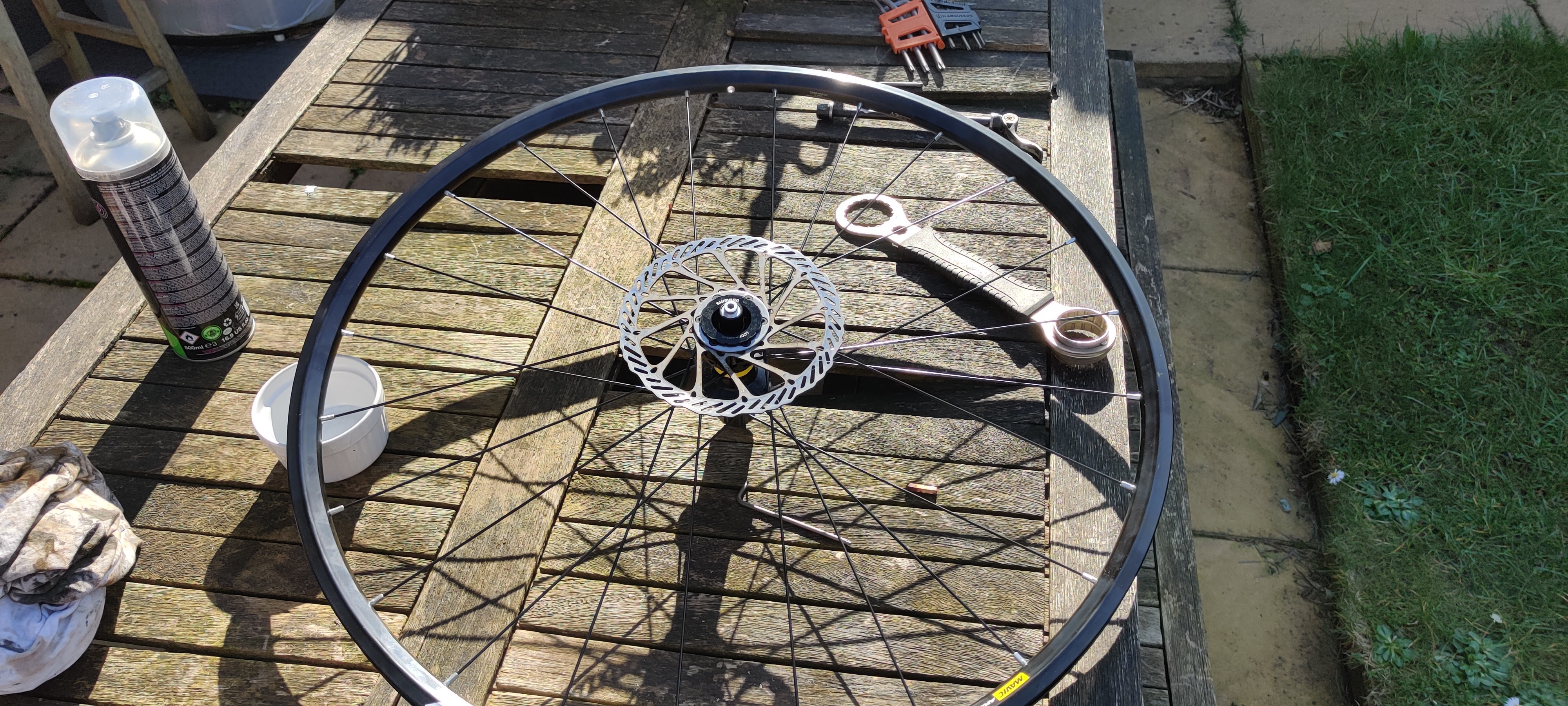 A wheel on the table with the rotor attached